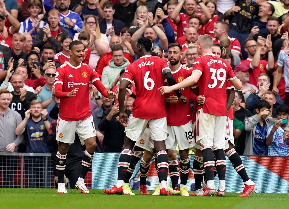 Manchester (United Kingdom), 14/08/2021.- Mason Greenwood of Manchester United (L) celebrates after scoring during the English Premier League soccer match between Manchester United and Leeds United in Manchester, Britain, 14 August 2021. (Reino Unido) EFE/EPA/Andrew Yates EDITORIAL USE ONLY. No use with unauthorized audio, video, data, fixture lists, club/league logos or 'live' services. Online in-match use limited to 120 images, no video emulation. No use in betting, games or single club/league/player publications.